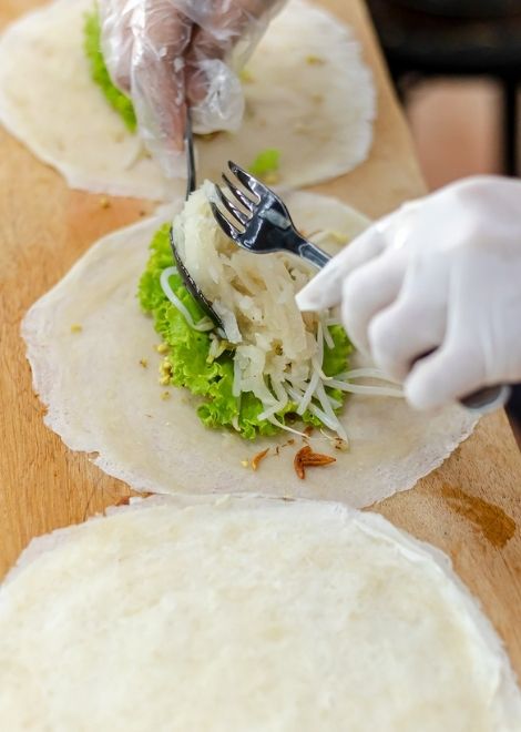 Fujian crepes wrapped around tofu, char sui pork, bean sprouts, greens and tamarind sauce.