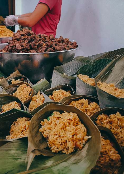 Traditional Phuketian sticky rice steamed in banana leaves